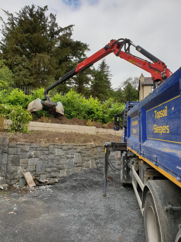 Grab-truck-spreading-decorative-stone-Galway